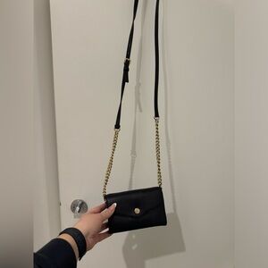 37. Michael Kors Crossbody Wallet